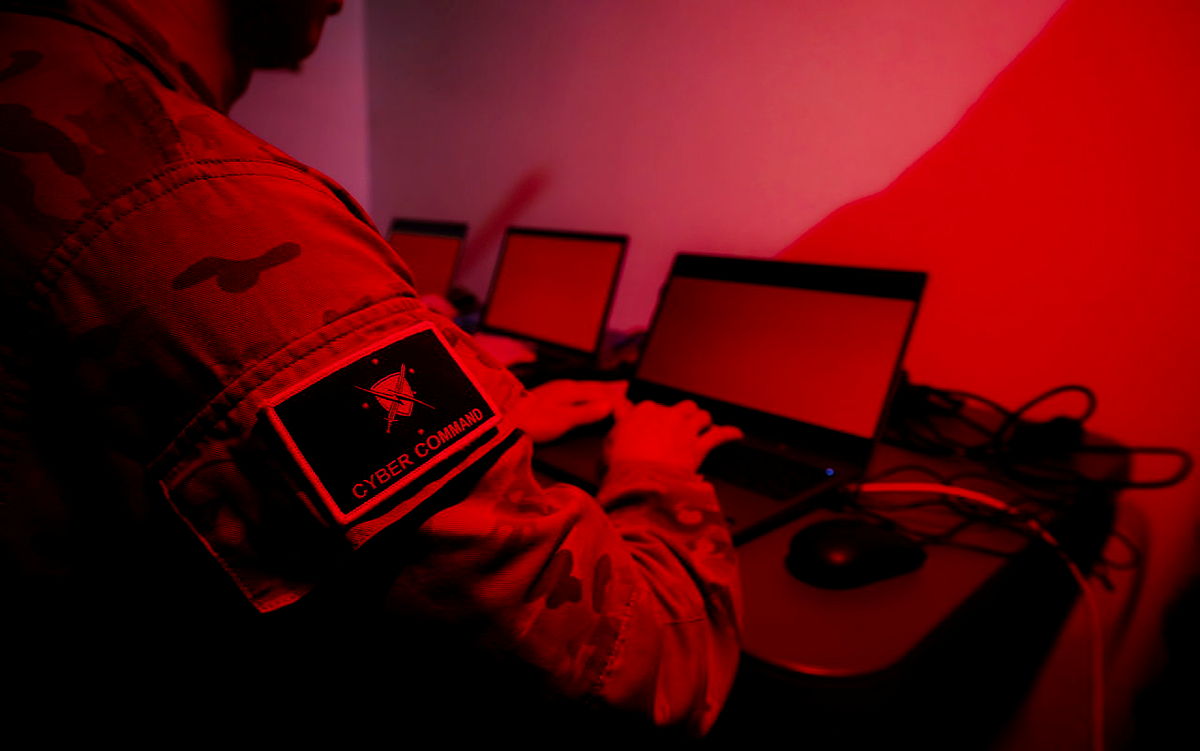 Cyber Command specialist working with secure digital systems.